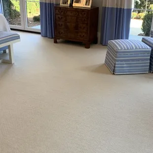 a bedroom with blue and white decor
