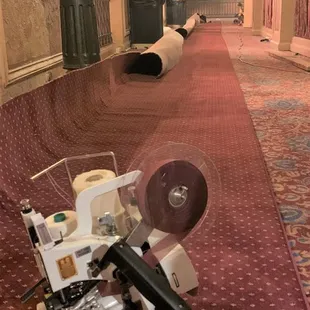 a carpeted hallway with carpeting