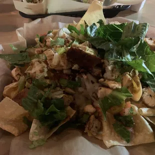 Buffalo Chicken Tacos (back) and Chicken Nachos (front). Basic but hit the spot. Queso on the nachos is good. Great value.