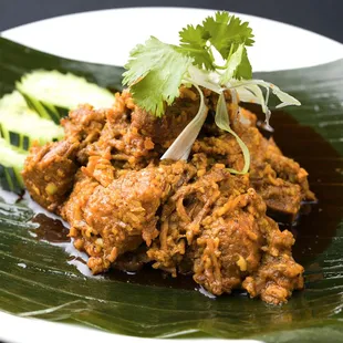 Beef Rendang - a semi-dry coconut curry simmered to perfection in exotic spices.