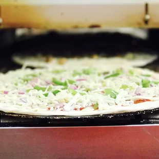the pizza being cooked