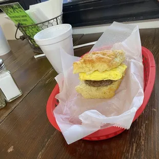 Sausage and egg and a large buttermilk biscuit