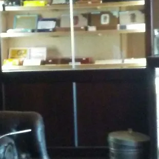 a black leather chair in a cigar shop
