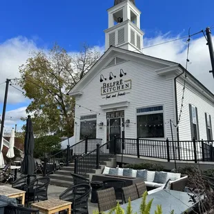 a white church with a steeple