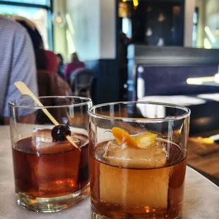 Bourbon cognac old fashioned &amp; a black manhattan