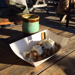 Whipped cream and powdered sugar liege waffle with cocoa cinnamon latte. Mmmmm