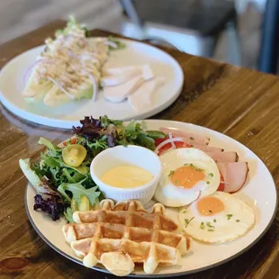 Classic croque madame and chicken Caesar salad.