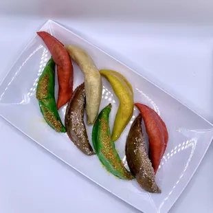 a platter of colorful sweets