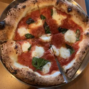 Margherita pizza. Would have pics of the other pizzas but we ate them too fast.
