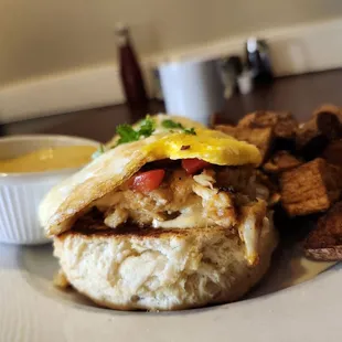 Lump crabcake, eggs, cheese biscuits, and potatoes