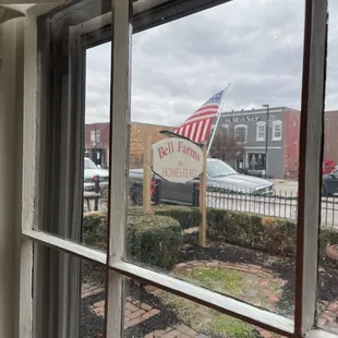 a view of a street through a window