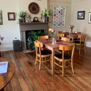 a dining room with a fireplace