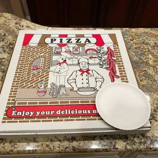 Yes, that is a regular size plate! This pizza is massive!