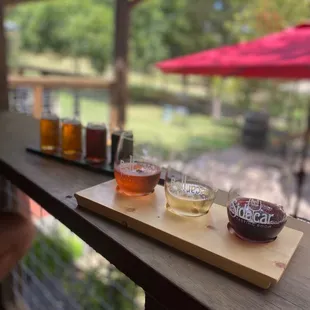 Wine sampler and beer flight outside
