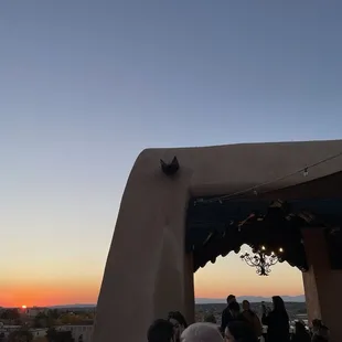 the sun setting over the city