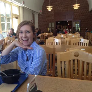 a woman sitting at a table