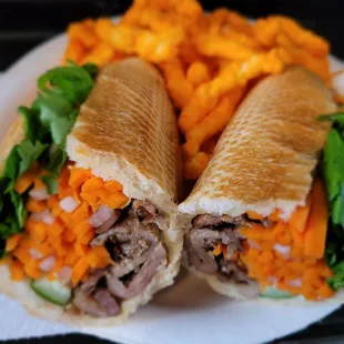 Lunch@Bella Banh Mi; 6/26/2023.Take out &amp; enjoy@home, R Banh Mi Delcious Sandwiches, w/R Split A/C on 77°.Lol! Xtra Veggies 4 me!Ty David!