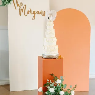 a wedding cake and flowers