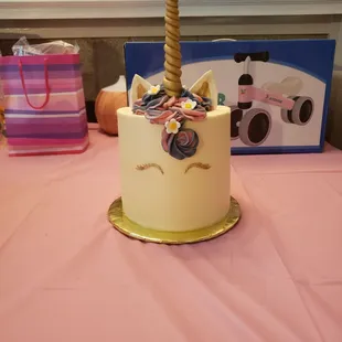 Unicorn face cake, 6 inch. 4 layers, vanilla cake w/vanilla filling.