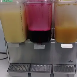 Cashew, gooseberry and passion fruit beverages at the lunch buffet (food sold by pound)