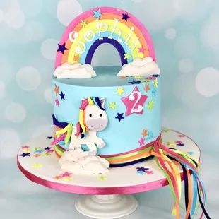 a cake with a rainbow