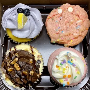 Three cupcakes and one cookie