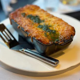 a plate of food with a fork and knife