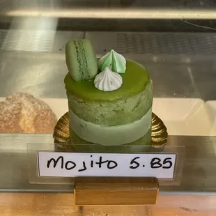 a display of a green cake