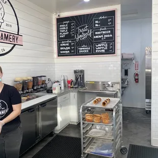 a woman standing in the kitchen