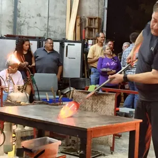 Chris McGahan blowing glass