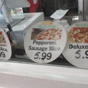 These are their slices.  It appears that what I call a "supreme" is their "deluxe."  See the labels "Bella Gina?"  "Bella Gina, come stai?"
