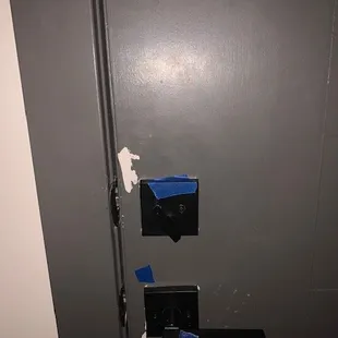 a door with a piece of tape taped to it
