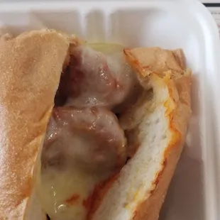 Meatball sub with meatballs cut in half. Not cool