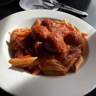 Penne with meatballs.