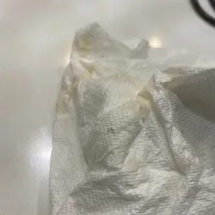 a piece of white tissue on a table