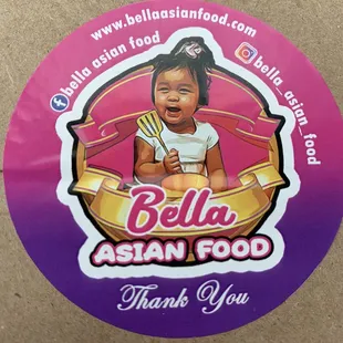 a sticker of a baby sitting on a plate