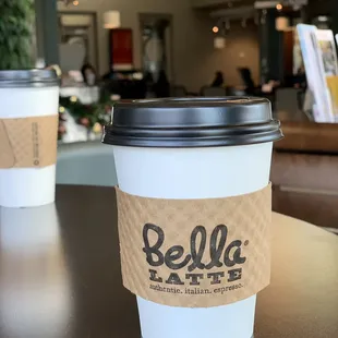 two cups of coffee on a table