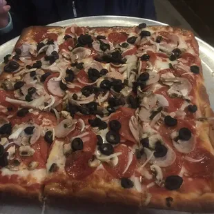 Sicilian style Bella Mia Supreme. 9 slices abd we took 6 home. We gonna get at least 4 meals out of this one. Very good pizza!!