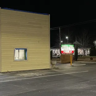 Exterior drive thru pick up window and sign