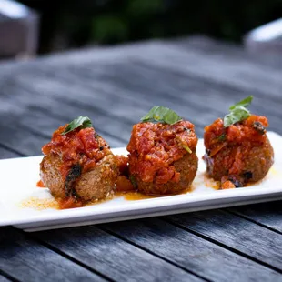 two meatballs on a plate