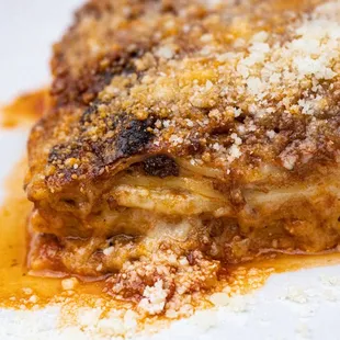 a piece of lasagna on a plate