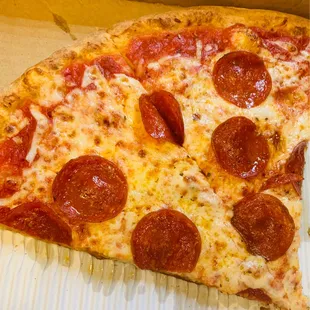 a slice of pepperoni pizza