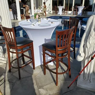 Spandex fitted linen on our Cocktail table and our wood cherry wood Cocktail bar stool.