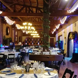 Transform any venue to a more romantic intimate venue. Market lights, chiffon swag, black chairs, our dishes, glasses and linens.