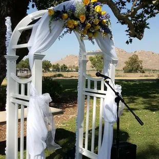 $95 arch rental plus added chiffin material. Flowers can be added as seen by your Florist.