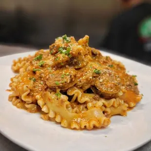 Pappardelle pasta over Italian sausage and spicy meat sauce!