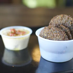 Falafel Cone
 3 large falafel patties and 2 oz hommos.
 
 #falafel #mediterranean #hommos