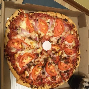 a pizza in a pizza box