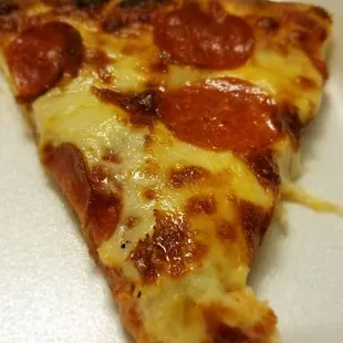 a slice of pepperoni pizza