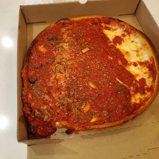 Deep Dish delivery. Where&apos;s the cheese? Maybe slid off. Note to delivery driver- keep level.
